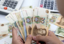 Yuan tergelincir 83 basis poin menjadi 7,1188 terhadap dolar AS