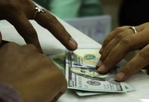 Dolar naik tipis di awal sesi Asia ketika kekhawatiran resesi membara
